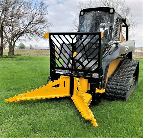 skid steer pulling trees|tree puller attachment for tractor.